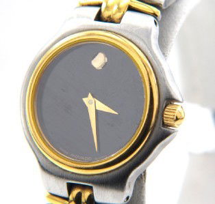 Movado Stainless Steel & Gold Plated Watch: Movado Stainless Steel & Gold Plated Watch The total watch's weight is 56 grams. The measurements of the watch head is 21 x 25 mm and 4 mm thick The length of watch: 8" Swiss Made Water Resistant Chai