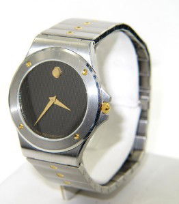 Movado 2-Tone Stainless Steel Quartz Watch: Movado 2-Tone Stainless Steel Quartz Watch.The total watch's weight is 83.4 grams.The measurements of the watch head is 32 x 32 mm and 4 mm thick.The length of watch: 7.25".Swiss Made.Water Resistant.
