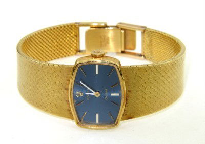 Rolex Orchid 18K Yellow Gold Watch: Rolex Orchid 18K Yellow Gold Ladies Watch.The total watch's weight is 53.7 grams.The size of watch head: 24 x 18 mm and 6 mm thick.The length of the watch is 6.75".Swiss Made.Water Resistant.Chain is