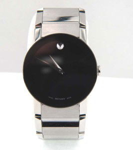Movado Stainless Steel Watch: Movado Stainless Steel Watch.The total watch's weight is 116.9 grams.The measurements of the watch head is 34 x 34 mm and 5 mm thick.The length of watch: 6.5".Swiss Made.Water Resistant.Chain is 21 mm