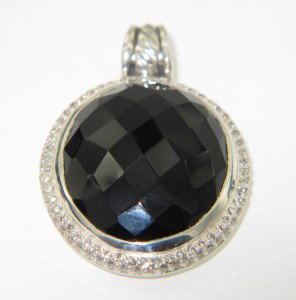 David Yurman Silver Onyx & Diamond Pendant: David Yurman Silver Onyx & Diamond Pendant.The total Pendant's weight is 12.3 grams.The total weight of diamonds is 1 cts. approximately I and SI clarity.The size of the Onyx is 12 x 11 mm.The size of