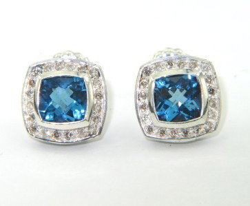 David Yurman Silver Diamond & Blue Topaz Earrings: David Yurman Silver Diamond & Blue Topaz Earrings.The weight of the Earring is 5.1 grams.The total weight of diamond: 0.49 cts. I color SI clarity.The size of blue topaz is 8 x 8 mm .The size of the e