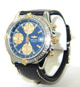 Breitling 18K Gold Stainless Steel Chronograph Wa: Breitling 18K Yellow Gold Stainless Steel Chronograph Black Leather Strap Mens watch.The total watch's weight is 104.2 grams.The measurements of watch head is 37 x 37 mm and 12 mm thick.The length of 
