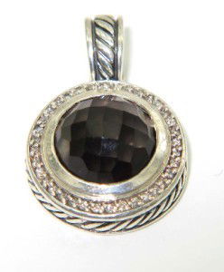 David Yurman Silver Smoky Topaz & Diamond Pendant: David Yurman Silver Smoky Topaz & Diamond Pendant The total Pendant's weight is 11.4 grams. The total weight of diamonds is 0.30 cts. approximately I and SI clarity. The size of smoky topaz is 11 x 11