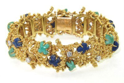 Van Cleef &Arpels18K Yellow Gold Diamond &StoneBra: Van Cleef & Arpels 18K Yellow Gold Diamond & Multi-Color Stones Bracelet.The total weight braelet is 85.6 grams.The total weight of diamond is 1 ct. approximately, G color VVS clarity.The size of each