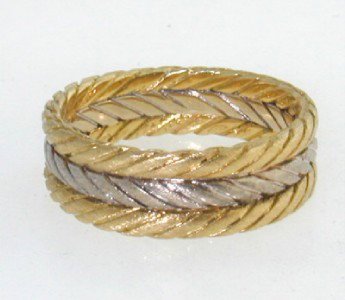 Buccellati 18K Two-toned Gold Ring: Buccellati 18K Two-toned (White & Yellow) Gold Ring.The total ring's weight is 6.3 grams.The size of the ring is 7.75