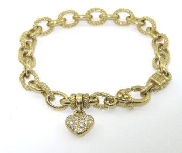 Judith Ripka 18K Yellow Gold, Diamond Bracelet: Judith Ripka 18K Yellow Gold, Diamond Bracelet. The total weight of bracelet is 35.1 grams. The toal weight of diamond is 0.6 ct. approximately, G color VS clarity. The measurement of Bracelet is 7.5"