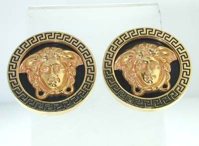 Versace 18K Yellow Gold Earrings: Versace 18K Yellow Gold Earrings The total earrings weight is 30.0 g The size of earring: 25 mm There is the versace logo and 750 stamp on the earrings.