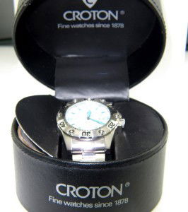 Croton Stainless Steel Watch: Croton Stainless Steel Date Just Watch.The total watch's weight is 175.7 grams.The measurements of the watch head is 30 mm in diameter and 13 mm in thick.Chain is 20 mm wide.The length of watch: 8.5".