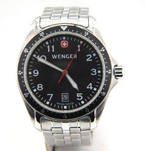 Wenger Stainless Steel DateJust Watch: Wenger Stainless Steel DateJust Mineral Crystal Watch.The total watch's weight is 107.6 grams.The measurements of the watch head is 38 x 38 mm in diameter and 8 mm in thick.The length of watch: 7.75".