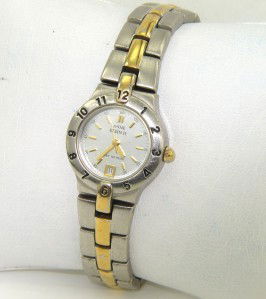 Anne Klein Stainless Steel Watch: Anne Klein Stainless Steel Date Just Watch.The total watch's weight is 61.6 grams.The measurements of the watch head is 22 x 22 mm and 5 mm in thick.The length of watch: 7.25".Water Resistant.Chain is