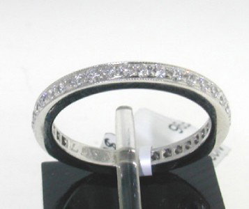 Tiffany & Co Platinum Diamond Ring.: Tiffany & Co Platinum Diamond Ring.The total ring's weight is 3.4 grams.The weight of Diamond is approximately 0.8cts . G color VVS clarity.The size of the ring is 4.5, 1 mm wide