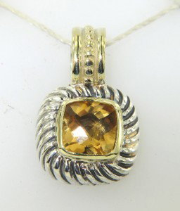 David Yurman Silver & 18K Gold Citrine Pendant: David Yurman Silver & 18K Gold Citrine Pendant The weight of the Pendant is 5.2 grams The size of the citrine is 7 x 7 mm The measurement of pendant is 20 x 12 mm and 4 mm in thickness There is D.Y',9