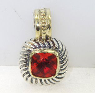 David Yurman Silver & 18K Gold Fantasy Citrine Pen: David Yurman Silver & 18K Gold Fantasy Citrine (Orangish Red) Pendant The weight of the Pendant is 5.1 grams The size of the fantasy citrine is 7 x 7 mm The measurement of pendant is 20 x 12 mm and 4