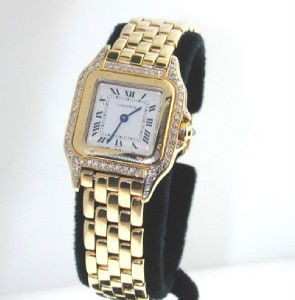 Cartier 18K Yellow Gold, Diamond Watch.: Cartier 18K Yellow Gold, Diamond Watch.Watch's Weight : 63.8 grams.The total diamond weight: 1.1 cts. H color, VS clarity.The length of watch: 4.5" , 11 mm wide.Swiss made.Water resistant