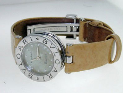 Bvlgari Stainless Steel, Leather Strap watch: Bvlgari Stainless Steel, Leather Strap watch with extra leather strap & Certificate The total watch's weight is 25.8 grams. The measurements of watch head is 21 x 21 mm and 7 mm thick. The length of w