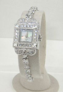 Croton Stainless Steel Quartz Watch: Croton Stainless Steel Quartz Watch The total watch's weight is 34.1 grams The measurements of the watch head is 27 x 18 mm and 7 mm in thick The length of watch: 7.5" Swiss Movement