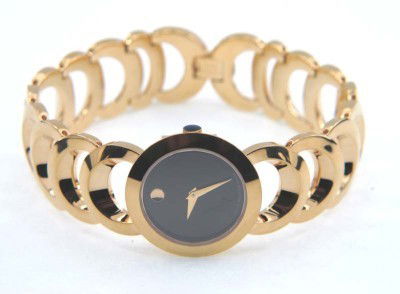 Movado Stainless Steel Watch: Movado Stainless Steel Watch The total watch's weight is 56.1 grams. The measurements of the watch head is 18 x 24 mm and 4 mm thick The length of watch: 7.25" Swiss Made Water Resistant Ch