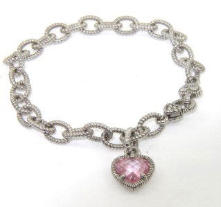 Judith Ripka Silver Pink Topaz Bracelet: Judith Ripka Silver, Pink Topaz Bracelet. The total weight of Bracelet is 16 grams. The measurements of pink topaz: 7 x 7 mm and 1 mm in thickness. The measurement of bracelet: 7.5" long. Chain is 6 m