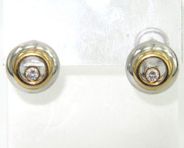Chopard 18K 2-Toned Gold Happy Diamon: Chopard 18K 2-Toned (White & Yellow) Gold Happy Diamond Earrings.The total Earrings' weight is 13.8 grams.The total diamond weight is 0.21 cts ,approxmiately. G color, VS clarity.The Size of the earri
