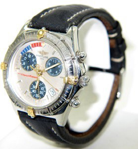 Breitling Stainless Steel Chronograph Mens Watch: Breitling Stainless Steel Chronograph Date Just Leather Strap Mens watch The total watch's weight is 69.3 grams. The measurements of watch head is 35 x 35 mm and 10 mm thick. The length of watch: 9.5"