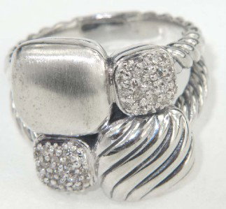 David Yurman Silver Diamond Ring: David Yurman Silver Diamond Ring The total ring's weight is 15 grams The total diamond weight: 0.20 cts. H - I color, SI clarity The measurement of ring surface: 19 x 22 mm , 4 mm thickness The size o