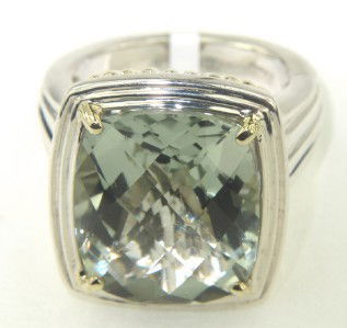 Charles Krypell 18K Gold/Silver Prasiolite Ring: Charles Krypell 18K Gold/Silver Prasiolite Ring The total ring's weight is 17.1 grams. The size of the prasiolite is 12 x 15 mm. The size of the ring is 7 The measurement of the face of the ring is 18