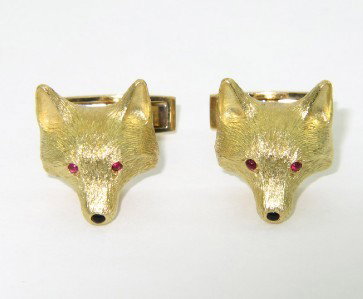 18K Yellow Gold, Ruby & Onyx Cufflinks: 18K Yellow Gold, Ruby & Onyx Cufflinks.The total weight of Cufflinks: 24 grams.The total weight of ruby is 0.05 pts. approximately.The total weight of onyx: 0.02 pts.The size of the Cufflinks face: 17