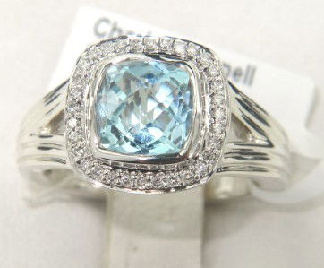 Charles Krypell 14K Gold/Silver Blue topaz Diamond: Charles Krypell 14K Gold/Silver Blue topaz and Diamond Ring The total ring's weight is 6.6 grams. The total weight of diamond 0.16 cts. H color VS clarity The size of the blue topaz is 6 x 6 mm. The m