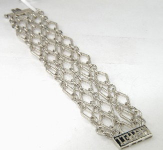 Charles Krypell Gold/Silver Bracelet: Charles Krypell 14K Gold/Silve Bracelet Weight of Bracelet: 65 grams The length of Bracelet: 6.75" The bracelet is 33 mm wide and 1 mm in thickness