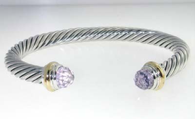 David Yurman Silver,14K Gold, Lavender Amethyst Ba: David Yurman Silver, 14K Yellow Gold, Lavender Amethyst Bangle. The total Bangle's weight is 40 grams. The size of Lavender Amethyst: 6 x 6 mm The measurement of the inside bangle is 58 x 49mm, Thickn