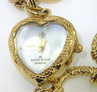 Anne Klein Stainless Steel Watch: Anne Klein Stainless Steel Watch The total watch's weight is 40 grams The measurements of the watch head is 21 x 21 mm and 6 mm in thick The length of watch: 8" Water Resistant Chain is 17 mm wide