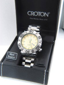 Croton Stainless Steel Automatic Skeleton Watch: Croton Stainless Steel Automatic Skeleton Watch The total watch's weight is 226.5 grams The measurements of the watch head is 45 mm in diameter and 13 mm in thick The length of watch: 7.75" Water Resi