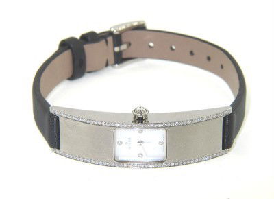 Milus Stainless Steel Diamond Leather Strap W: Brand New Milus Stainless Steel Diamond Leather Strap Watch With Box The total watch's weight is 19.4 grams. The total weight of diamond is 1 ct. approximately, G color VVS clarity. The measurements o