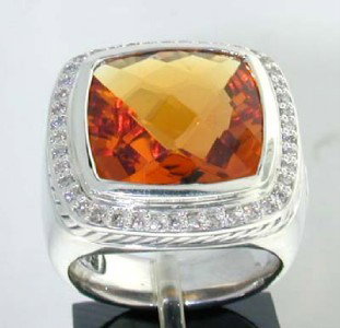 David Yurman Silver Citrine Diamond Ring.: David Yurman Silver Citrine Diamond Ring. The total ring's weight is 15.6 grams. The total weight of the diamond is 0.45 cts approximately, H color VS clarity. The size of the Citrine is 15 x 15 mm. T