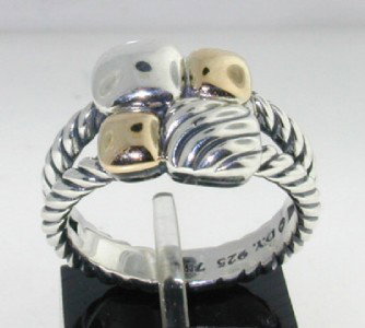 David Yurman 18K Yellow Gold, Silver Ring: David Yurman 18K Yellow Gold, Silver Ring. The total ring's weight is 6.7 grams. The size of the ring is 6.75