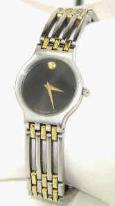 Movado 2-Tone Stainless Steel Quartz Watch: Movado 2-Tone Stainless Steel Quartz Watch The total watch's weight is 40.5 grams. The measurements of the watch head is 18 mm in diameter and 4 mm thick. The length of watch: 7.25". Swiss Made. Water