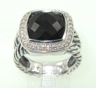 David Yurman Silver Onyx Diamond Ring: This is a Wonderful David Yurman Silver Onyx Diamond Ring. The total ring's weight is 7.9 grams. The total diamond weight is 0.20 ct ,approxmiately. I color SI clarity. The size of Onyx is 10 x 10 mm.