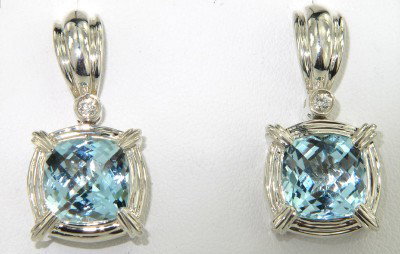 Charles Krypell Silver Blue Topaz Diamond Earring: Charles Krypell Silver Blue Topaz Diamond Earrings The weight of the Earring is 12.2 grams. The size of Blue Topaz is 9 x 9 mm . The total weight of diamond is 0.12 ct. approximately, H color VS clari