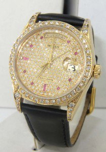 Rolex 18K Yellow Gold Diamond & Ruby President Wat: Rolex 18K Yellow Gold Day-Date, Diamond And Ruby, Sapphire Crystal Leather Strap President Watch The total watch's weight is 73.4 grams The total weight of diamond: 3.5 cts. approximately, H color,VS 