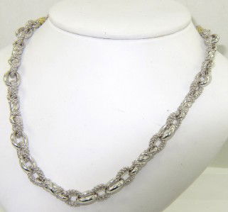 Judith Ripka Silver & 18K Yellow Gold Diamond Neckl: Judith Ripka Silver & 18K Yellow Gold Diamond Necklace. The total weight of Necklace is 62grams. The total weight of diamond: 0.18 cts. approximately. H color VS clarity. The necklace is 7 mm wide . T