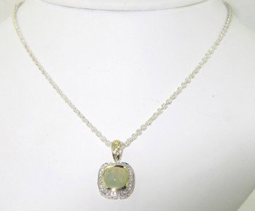 Charles Krypell Gold/Silver Chalcedony Diamond Nec: Charles Krypell 14K Yellow Gold/Silver Chalcedony Diamond Neckalce The weight of the Necklace is 8.9 grams The size of chalcedony is 6 x 6 mm The total weight of diamond is 0.15 cts. approximately, H