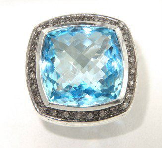 David Yurman Silver, Blue Topaz & Diamond Ring: David Yurman Silver, Blue Topaz & Diamond Ring The total ring's weight is 21.9 grams. The total weight of the diamond is 0.40 cts approximately, H color VS - SI clarity. The size of the blue topaz is 