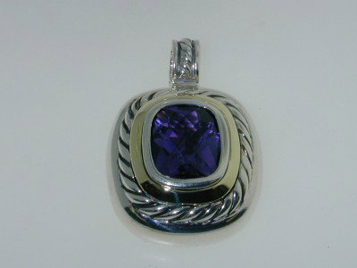 David Yurman Silver & 14K Gold Amethyst Pendant.: David Yurman Silver & 14K Gold Amethyst Pendant. The weight of the Pendant is 14.7 grams. The size of the Amethyst is 11 x 9 mm. The size of the pendant is 32 mm in length, 23mm in wide, 12 mm in thic