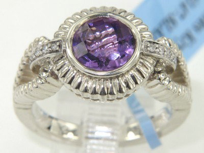 Charles Krypell 14K Gold/Silver Amethyst Diamond R: Charles Krypell 14K Gold/Silver Amethyst and Diamond Ring The total ring's weight is 7.6 grams. The total weight of diamond 0.06 pts.,approximately. H color VS clarity. The size of the amethyst is 6 x