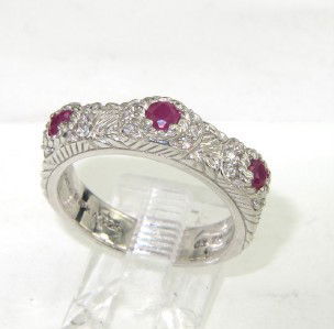 Judith Ripka Silver Ruby & Diamond Ring: Judith Ripka Silver Ruby And Diamond Ring The total ring's weight is 5.2 grams. The total weigth of diamond: 0.16 cts., approximately. H color VS clarity. The total weight of ruby: 0.3 cts., approxima