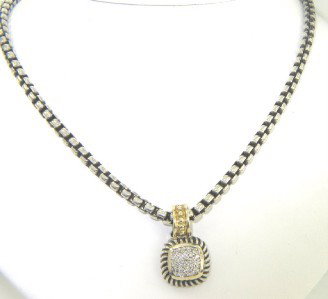 David Yurman Silver /18K Gold Diamond Necklace: David Yurman Silver/18K Yellow Gold Diamond Necklace The total necklace's weight is 28.8 grams. The total weight of diamonds is 0.4 cts. approximately H - I and VS - SI clarity. The size of the Pendan