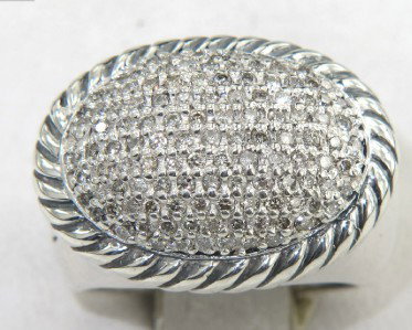 David Yurman Silver Diamond Ring: David Yurman Silver Diamond Ring The total ring's weight is 11.4 grams. The total weight of diamond is 0.93 cts. approximately , H - I color VS - SI clarity. The size of the ring's surface is 14 x 20 