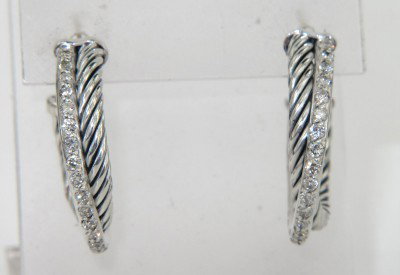 David Yurman Silver Diamond Earrings: David Yurman Silver Diamond Earrings The total earring's weight is 8.6 grams. The total weight of diamond: 0.57 cts., approximately. H - I color VS - SI clarity. The size of the earring is 23 x 23 mm.