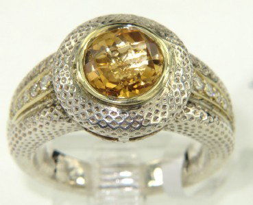 Charles Krypell Silver Citrine & Diamond Ring: Charles Krypell Silver Citrine and Diamond Ring The total ring's weight is 9.5 grams. The total weight of diamond 0.15 cts. H color VS clarity. The size of the citrine is 7 x 7 mm. The size of the rin